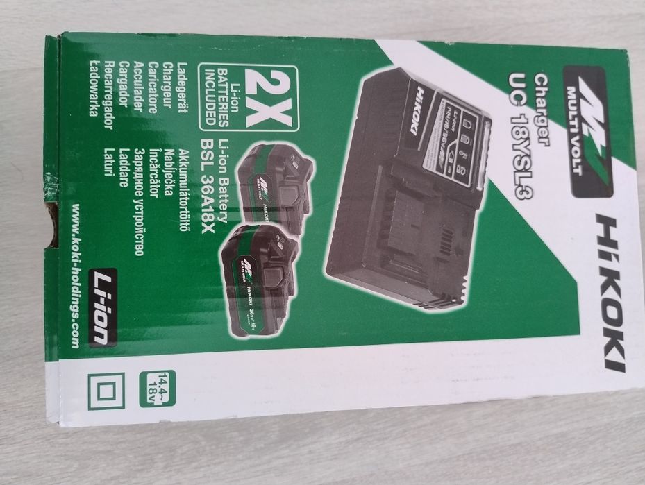 Set încărcător cu 2 bateri