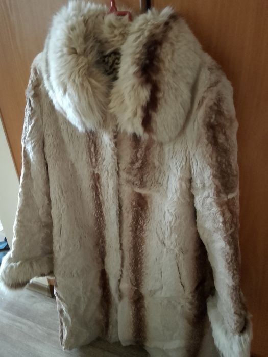 Пуховики женские