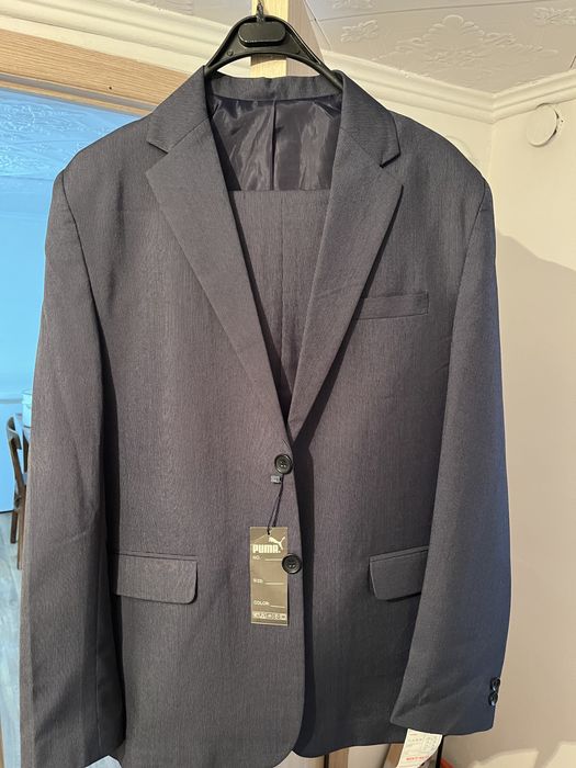 Продам новый костюм