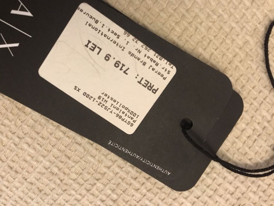 Pantaloni sport, cu capse