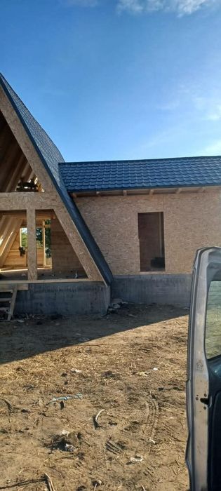 Executăm case din cabane în formă de tip A