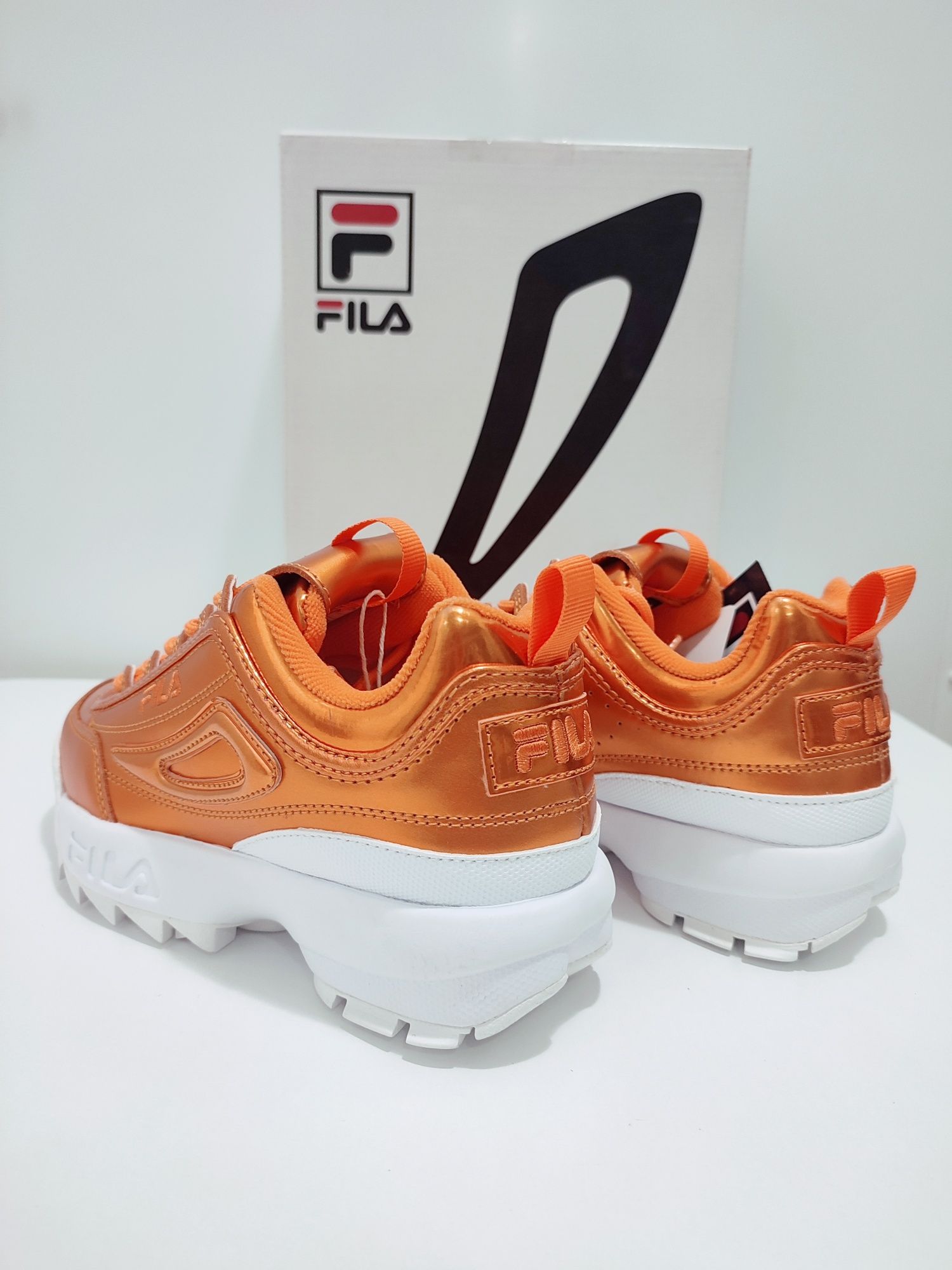 Fila deals disruptor bronze