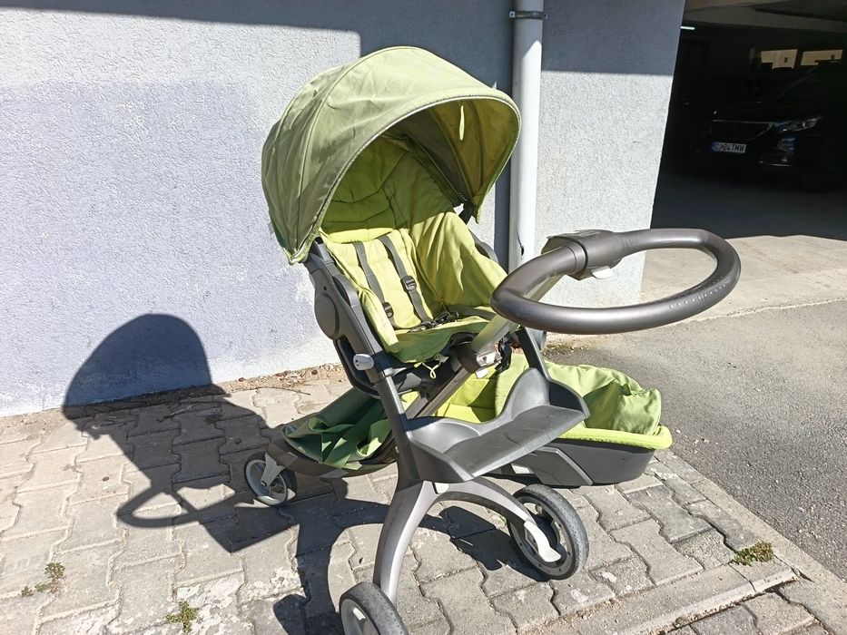 Vând cărucior stokke landou și parte sport