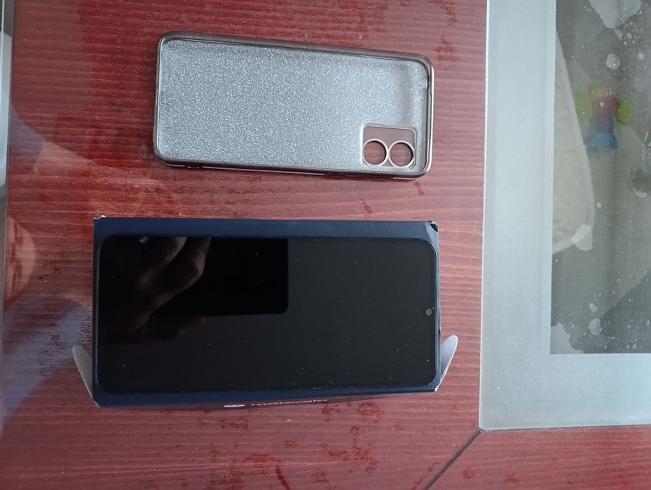 Телефон motorola е13