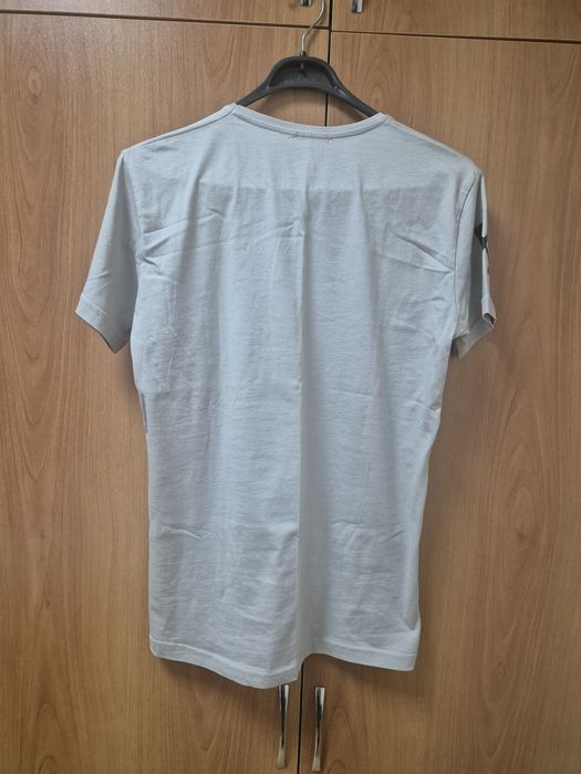 Продам новую футболку