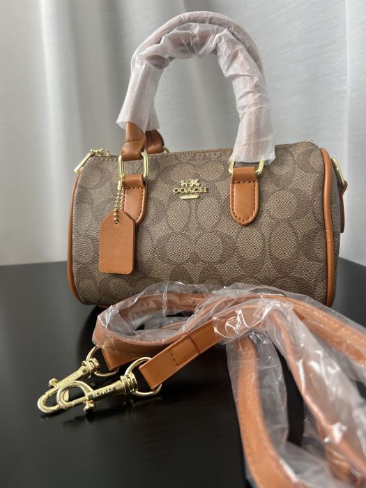 Geanta Coach maro cu imprimeu logo si detalii camel – stare noua