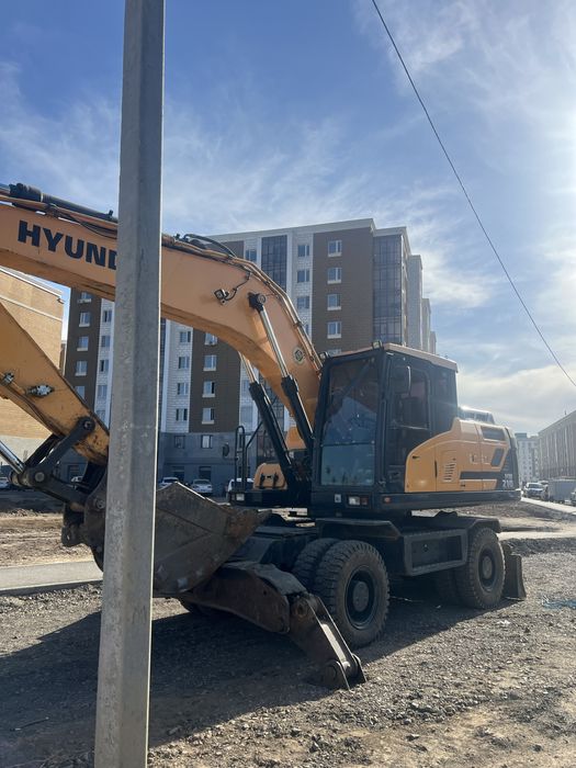 Колесный Эксковатор HW 210