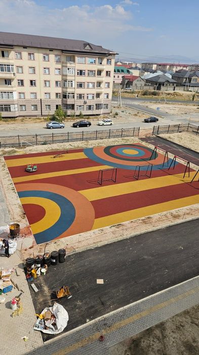 Резиновое покрытие от  5500 до 7000 т квм. Тартан.