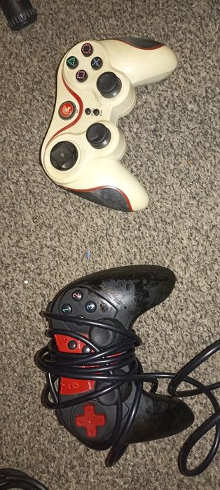 Ps3 + 2 manete + 2 jocuri