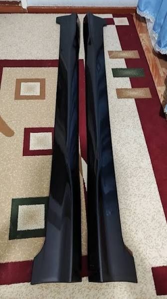 Спойлера обвесы пороги spark не крашеные только боковые передних нет