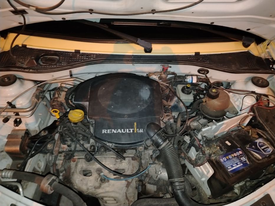 Дачиа логан 2012 1.6 газ бензин