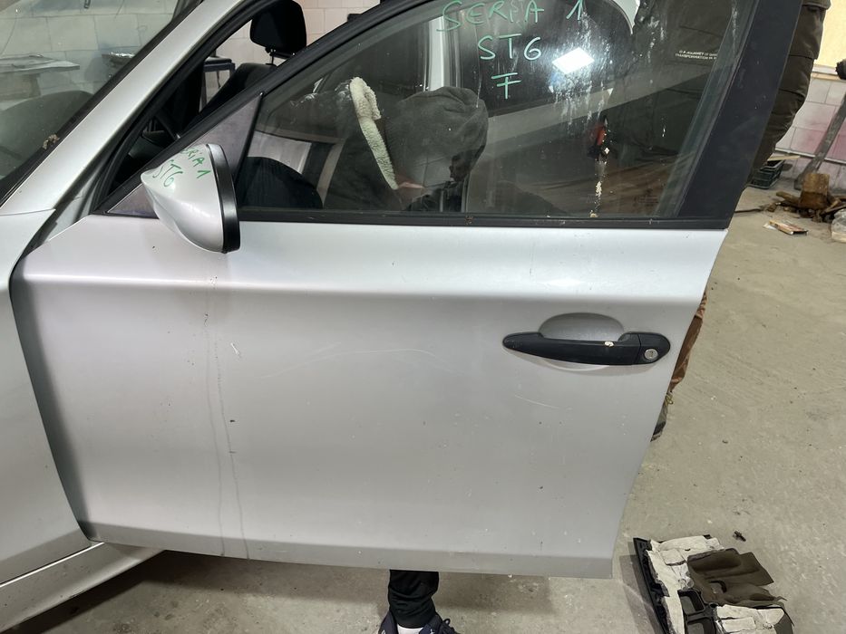 Usa stanga fata bmw seria 1