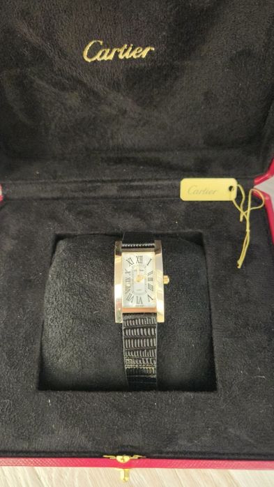 Золотые женские часы Cartier