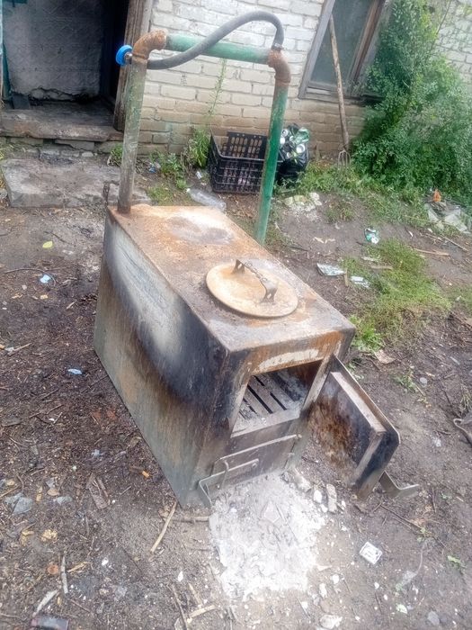 Кател отопления твердотопливный.