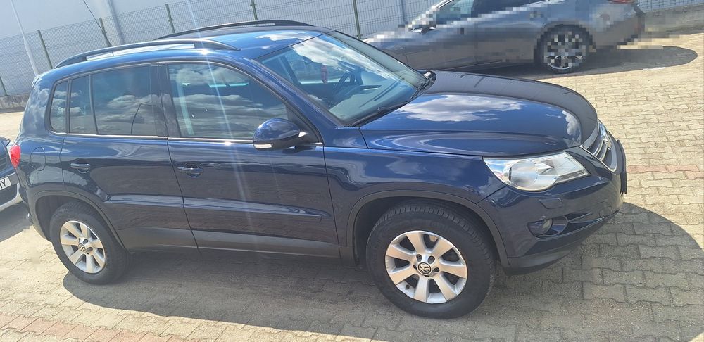 VW Tiguan  an 2011 motor 2.0i benzină 211 CP Full options 125.000 km 100% REALI Înmatriculat România taxe la zi distribuția schimbată etc;