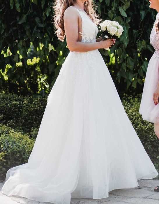 Прекрасна бутикова сватбена рокля-без следи от употреба!