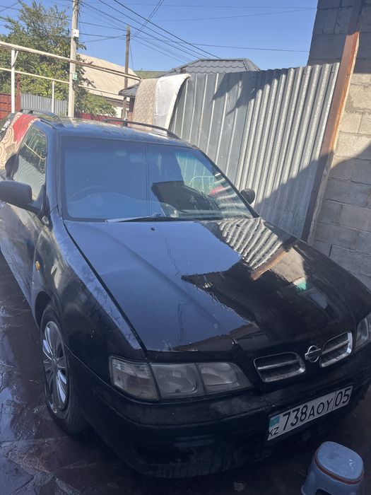 Машина ниссан примера