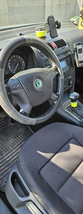 Vind urgent skoda octavia 2 din 2006cu akte în regula