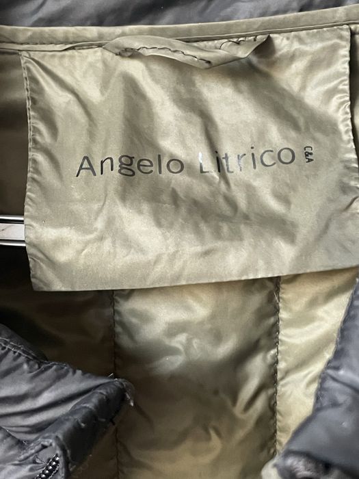 Дамски пухен елек