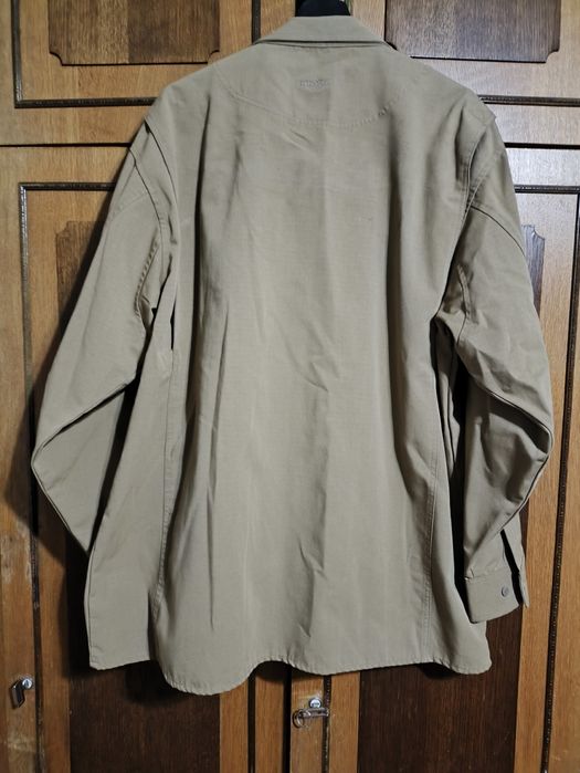 Куртка - ветровка бирюзового цвета 52-54