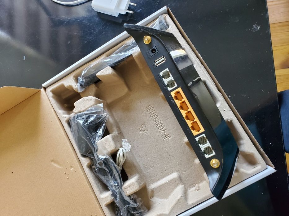 TP-LINK TD-VG3631 ADSL/VoIP/Wi-Fi роутер