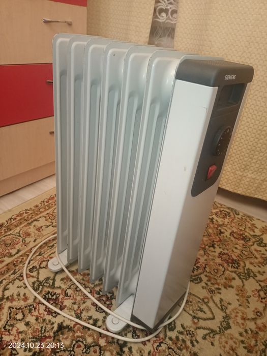 Масляный обогреватель