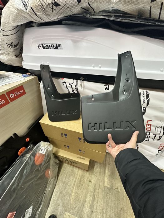 Брызговики на Hilux 2015 - выше