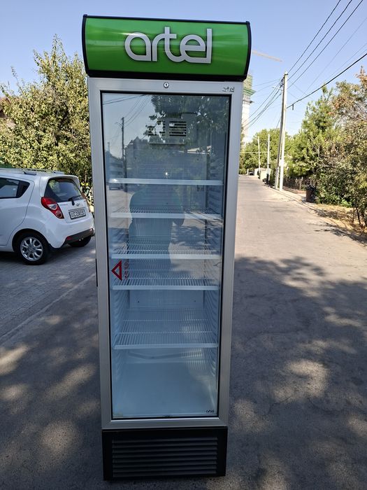 Срочно продам витрине холодильник артел как новый гарантия 3года есть