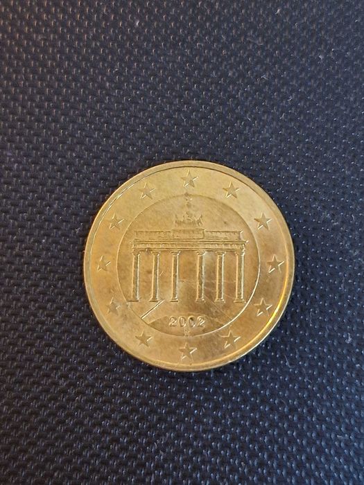 Монеты наминалом 10 евро центов.