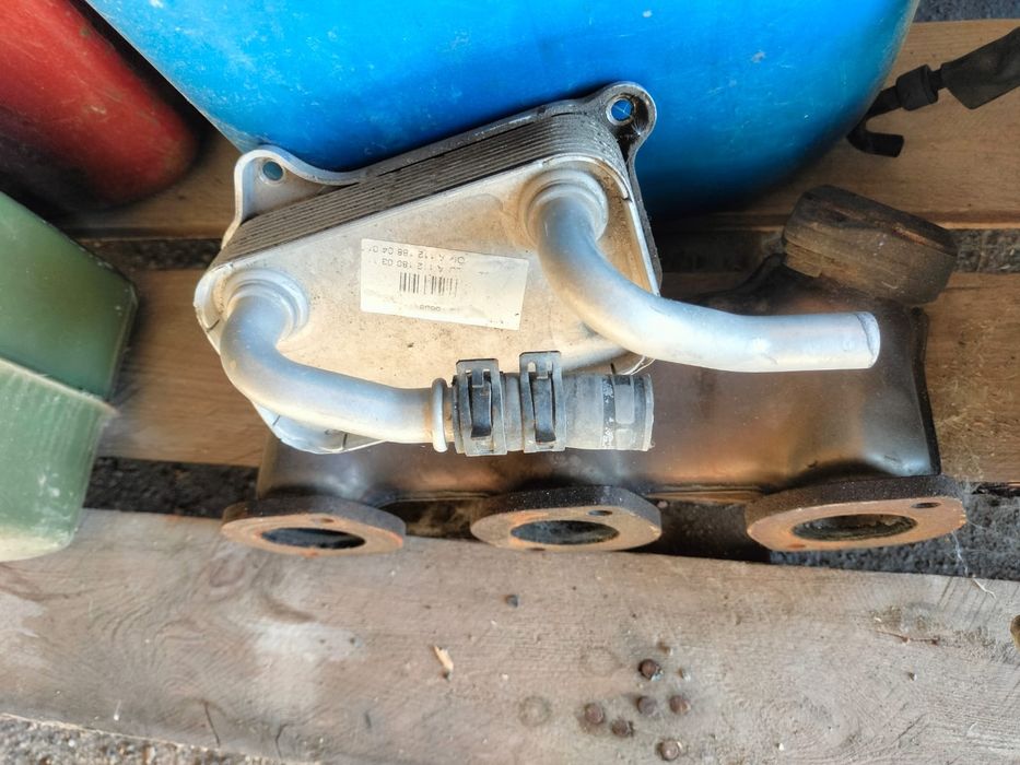 Теплообменник и дроссельная заслонка