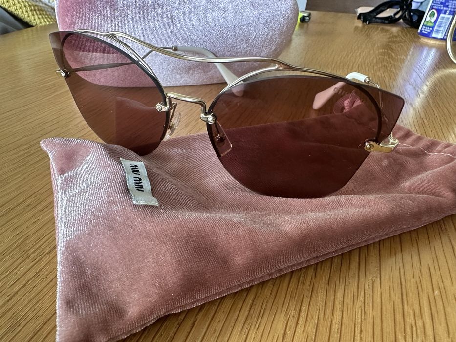 Слънчеви очилаMiu Miu