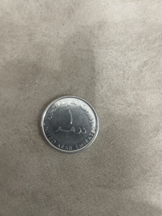 Монета арабских эмиратов с рисунком
