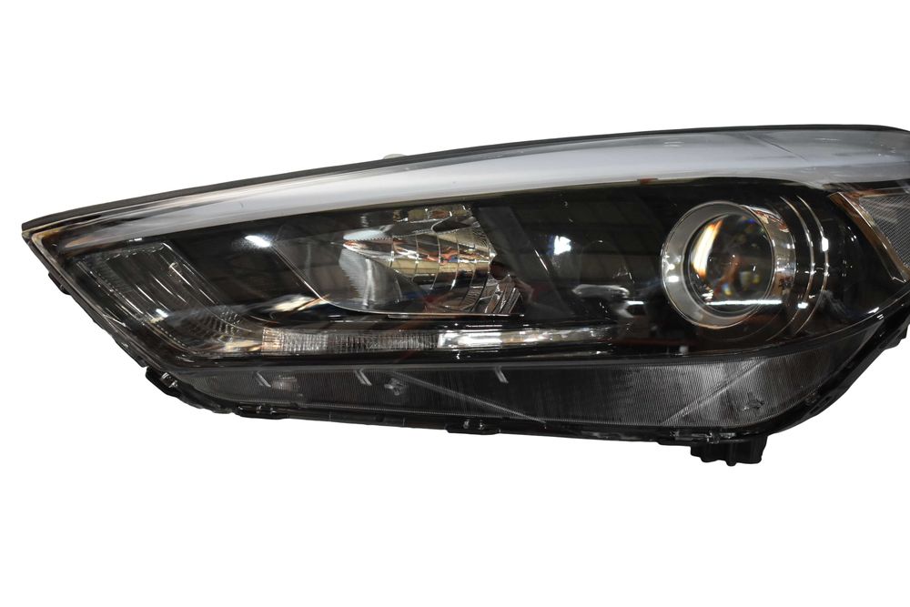 Фара (одна линза) LH Tucson 15-