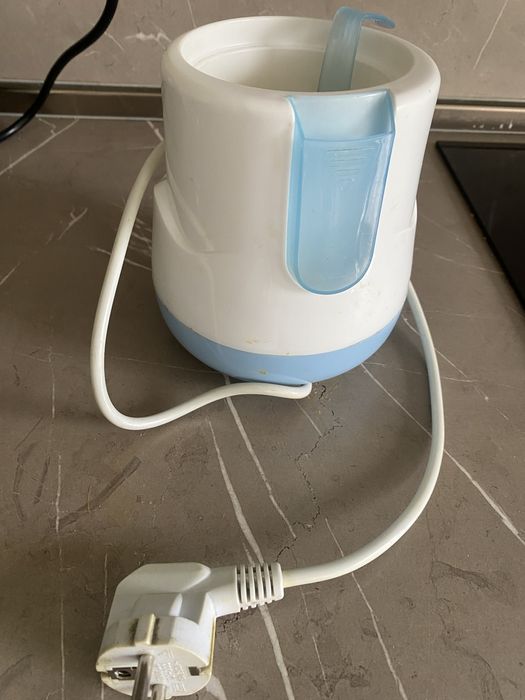 Уред за топлене на пара NUK