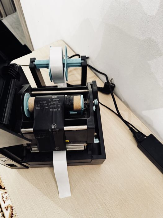 Принтер ленточный для этикеток Postek EM210