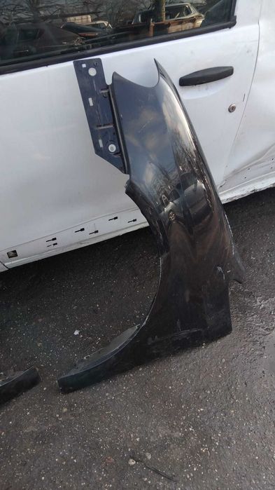 Aripa stanga/dreapta Volkswagen Touran an 2005