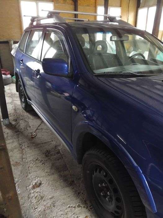 Мицубиши  олтлендър