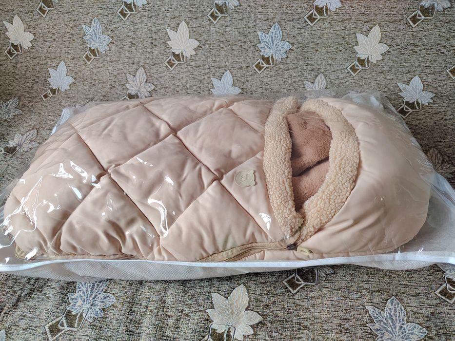 Срочно. Продам конверт и комбинезон