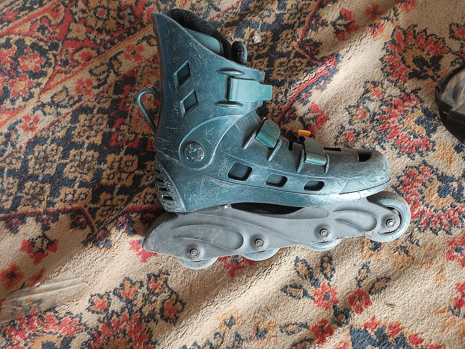 Роликовые коньки