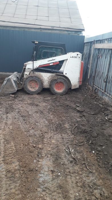 Услуги мини трактора бобкат в Уральске