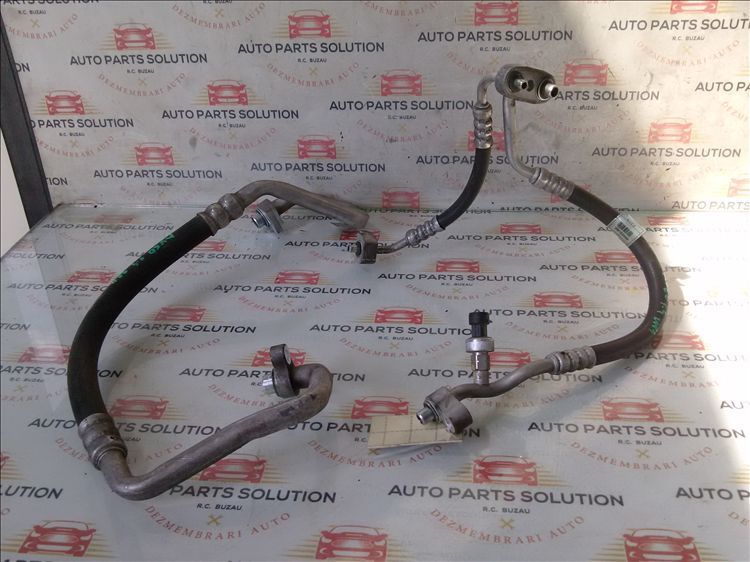 conducta ac   2 buc   chevrolet aveo 1.4 b an fabr. 2014