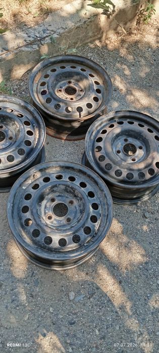 Диски стальные 4/100 R14.Поперечные рейлинги