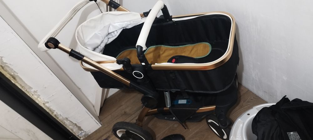 Коляска,ванночки, комбинезоны,стульчик