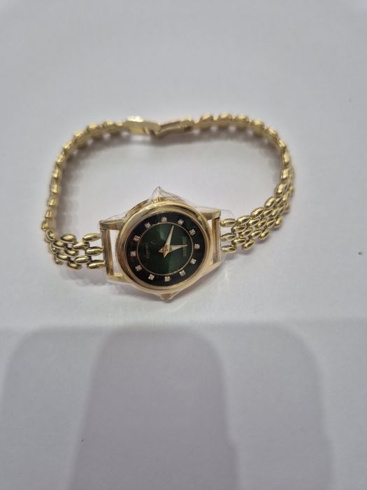 Продам золотой часы 750 пробы