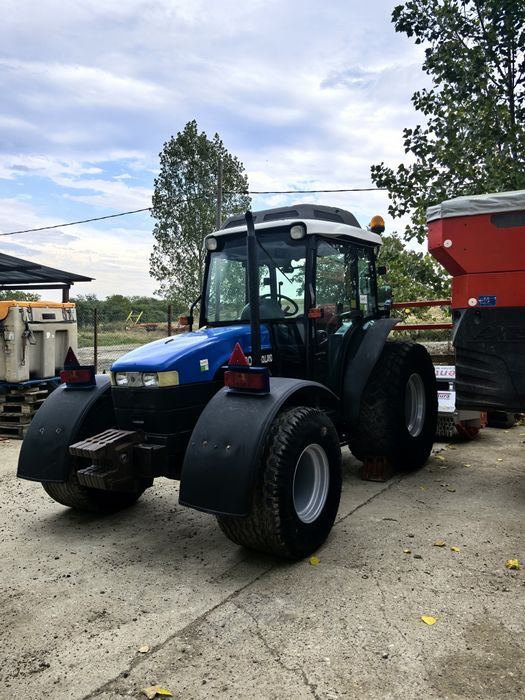 Tractor New Holland volan reversibil, freza forestiera tocător