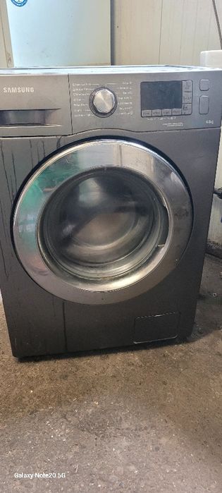 Masina de spalat cu incarcare frontala ,rata bine si merge impecabil