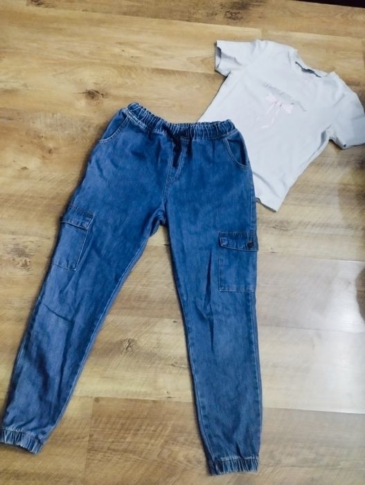 Джинсы на девочку 12-13лет