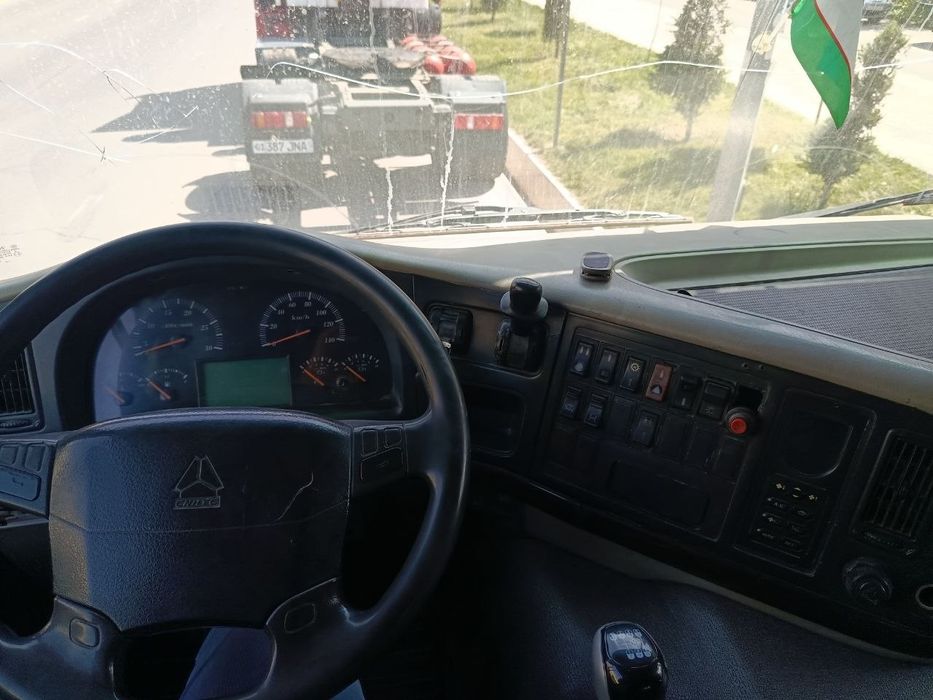 HOWO A6 + Контейнеровоз прицеп Сотилади