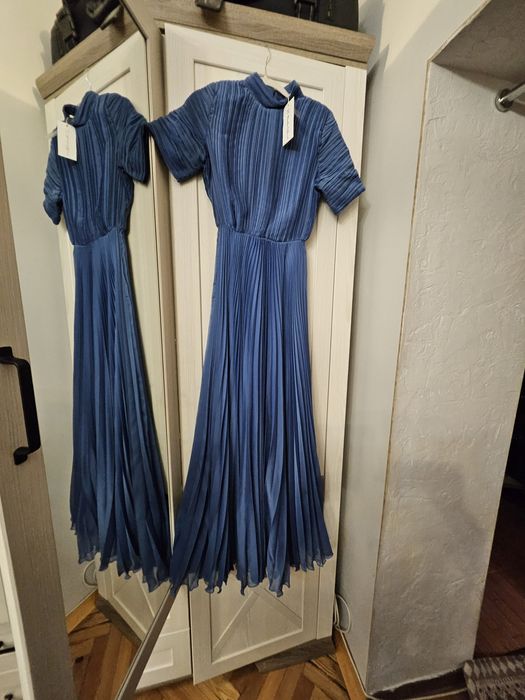 Пуховики, плащ, вечернее платье