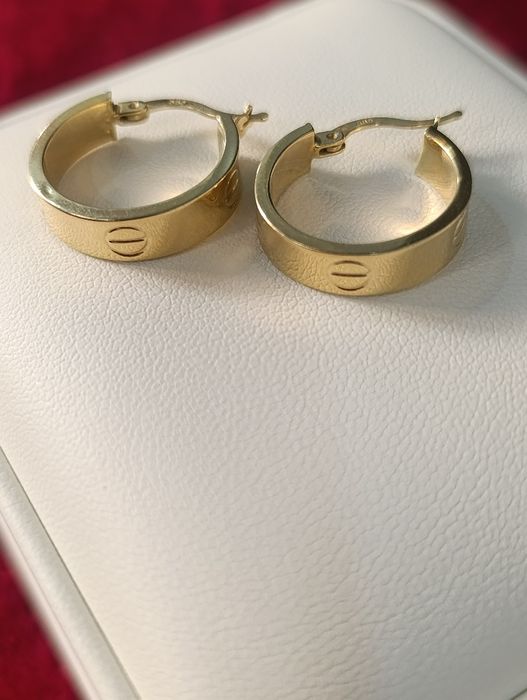 Золотые серьги CARTIER с кольцом, проба 585,вес 2,72,